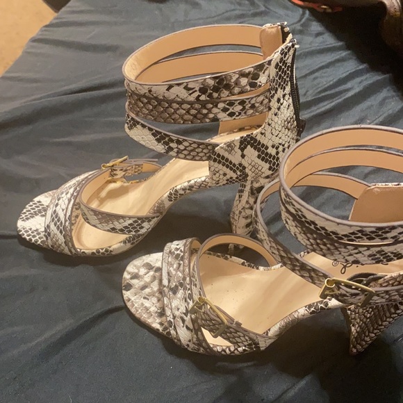 Size 6 1/2 Snake print strap heels only worn once . Very comfortablevery stylish - Picture 2 of 2